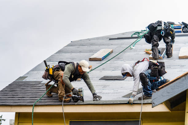 Professional Roofing technician working in Bridgewater, MA